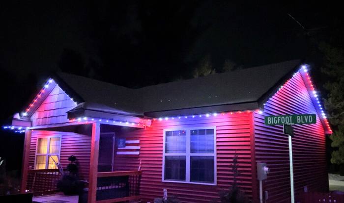 Home on Bigfoot Boulevard with purple and red Trimlight roofline